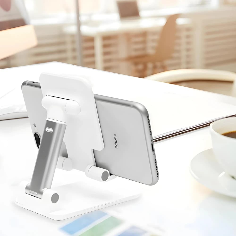 Suporte ajustável para celular e tablet em mesa branco e prata com iPhone apoiado