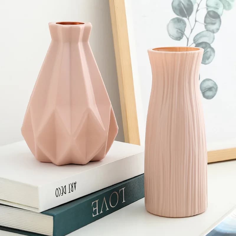 Vasos decorativos em imitação cerâmica rosa claro com design geométrico e listrado para plantas