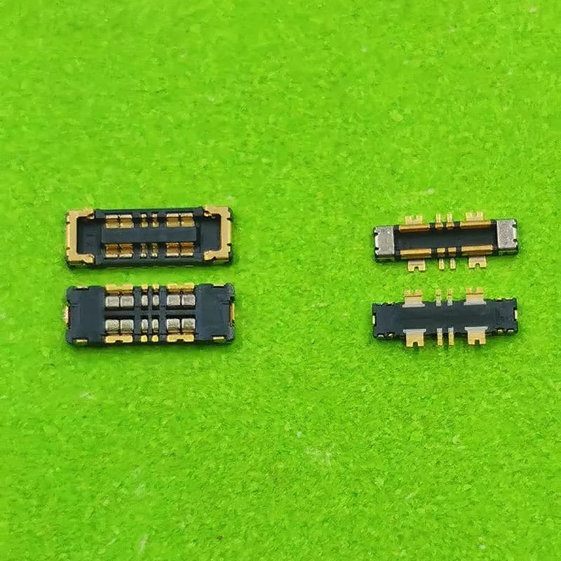 Conector FPC de bateria Xiaomi Mi 9T Pro K20 K20 Pro dourado e preto em fundo verde com duas peças