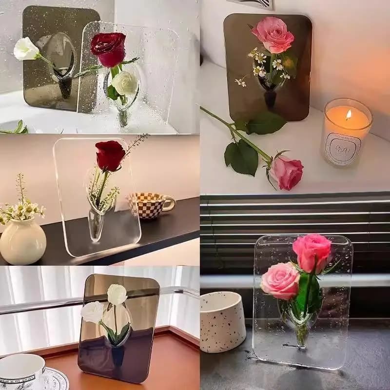 Coleção de vasos decorativos acrílicos em diferentes cores com flores vermelhas, brancas e rosas