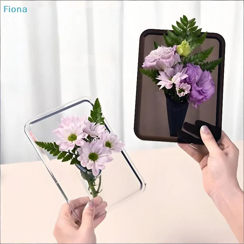 Dois vasos decorativos acrílicos transparentes e fumê com flores para centros de mesa