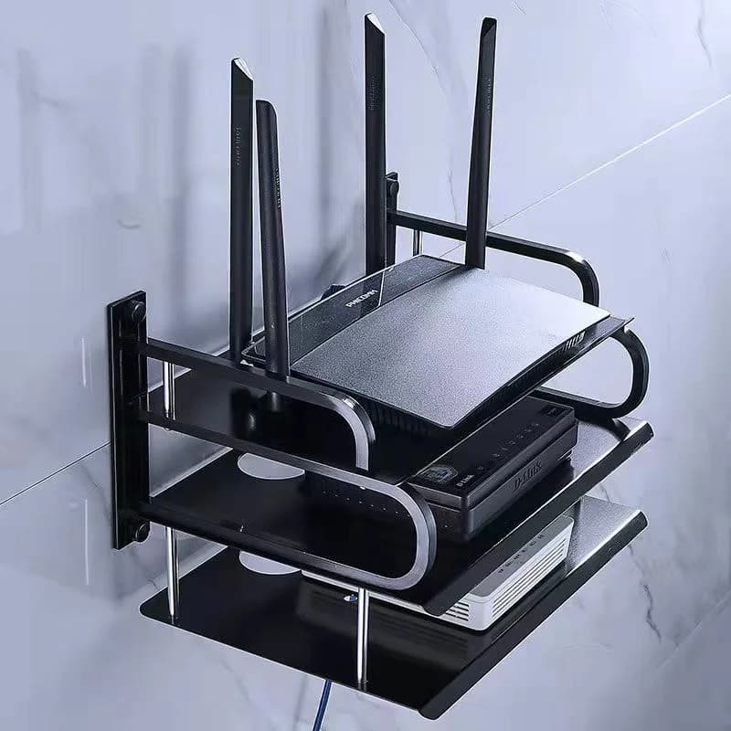 Suporte de montagem na parede para eletrônicos, preto com padrão de estrelas