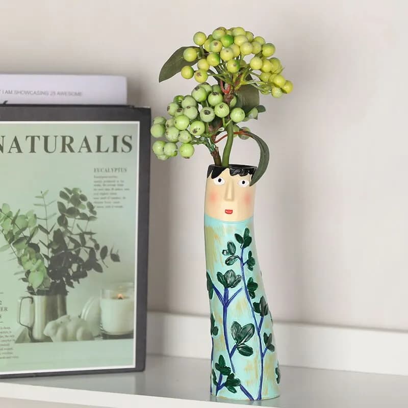 Vaso decorativo Bohemian Família Face artesanal azul claro com pintura de folhas e flores verdes