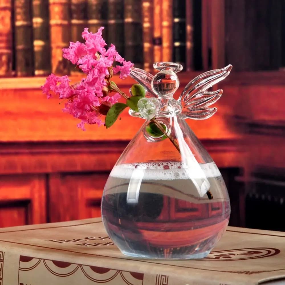 Vaso de vidro transparente em forma de anjo com flor rosa, decoração para casa e escritório.