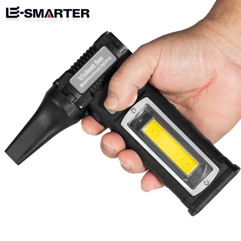 Secador de cabelo portátil USB preto com ventilador, luz LED e design compacto na mão
