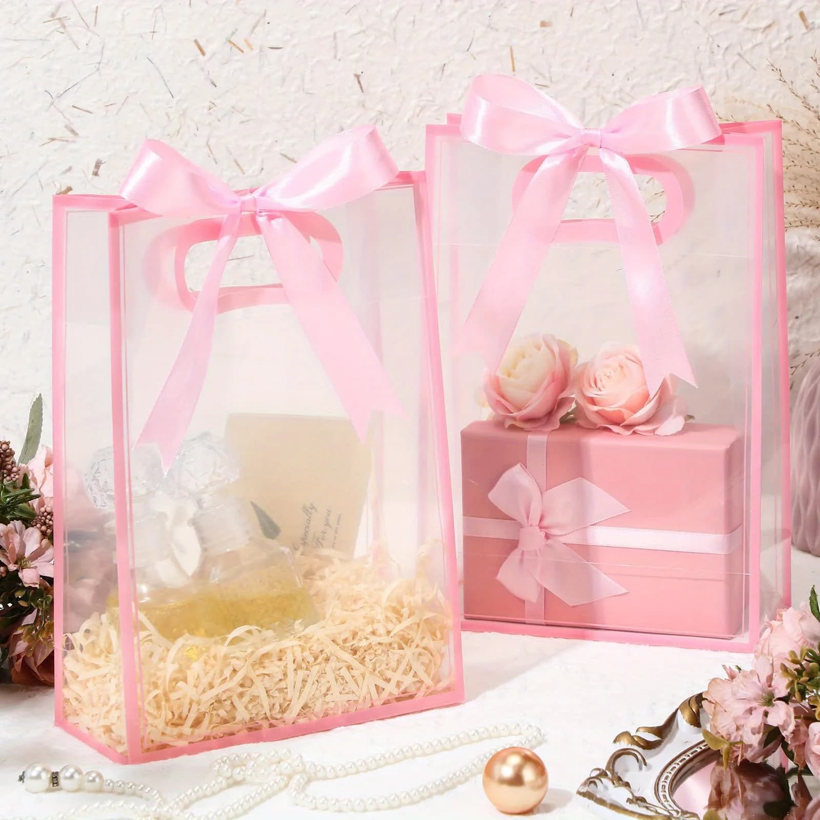 Saco de presente reutilizável Jácotei transparente com alças e fita rosa, conjunto 10 peças