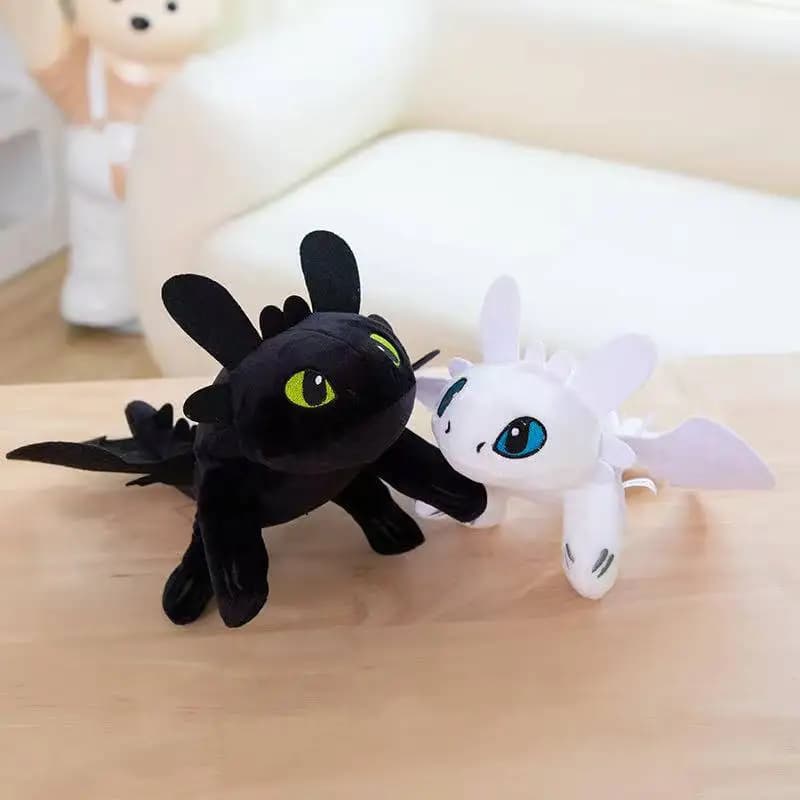 Brinquedos de pelúcia dragão preto e branco macios para crianças com detalhes coloridos nos olhos