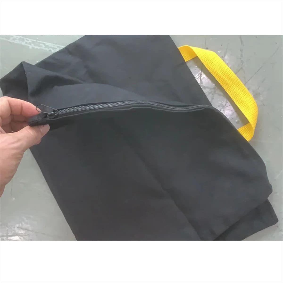 Detalhe do zíper e alça amarela do saco de pó preto para aspirador Karcher WD4 WD5 WD6