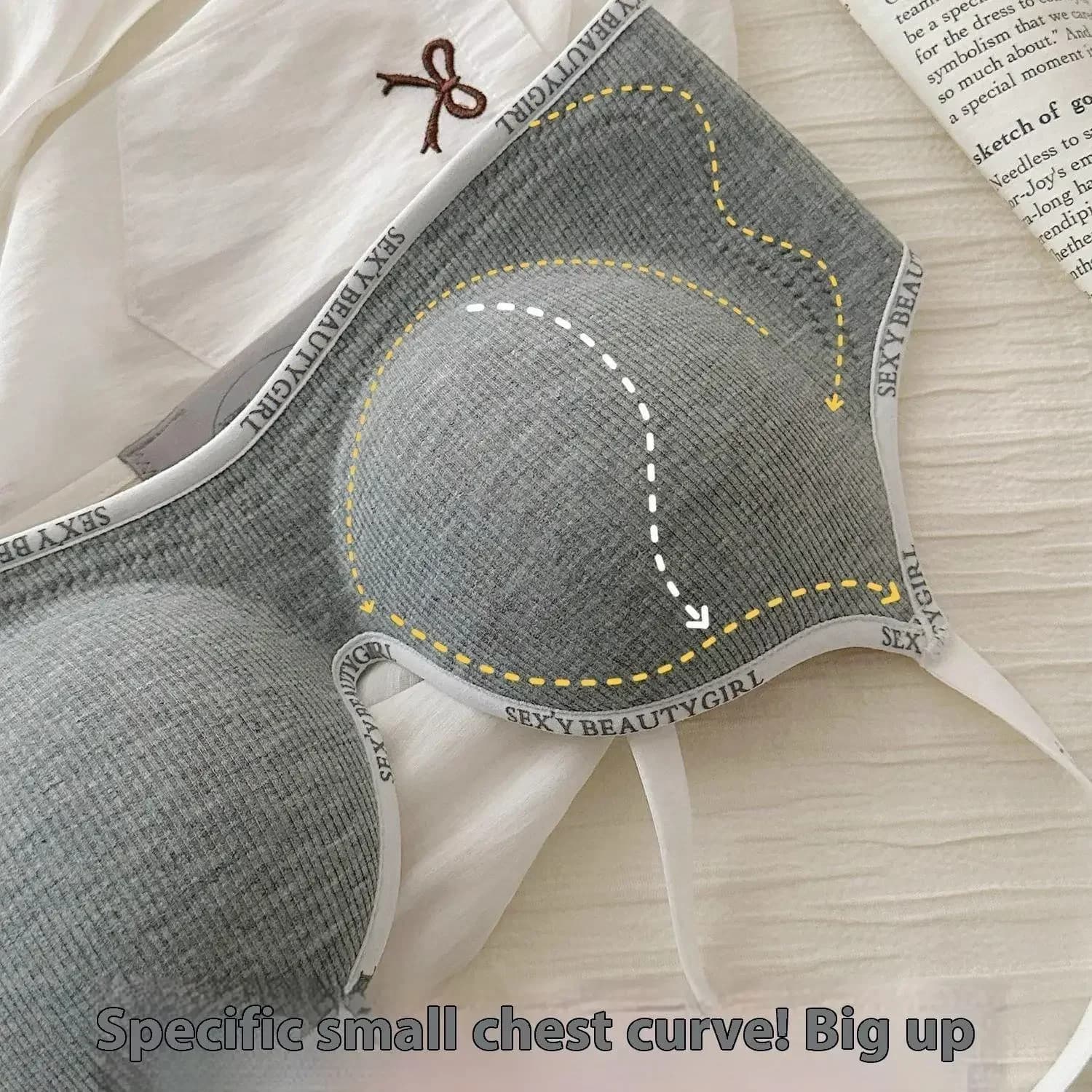 Sutiã push up cinza com costura destacada mostrando design anatômico para sustentação e conforto