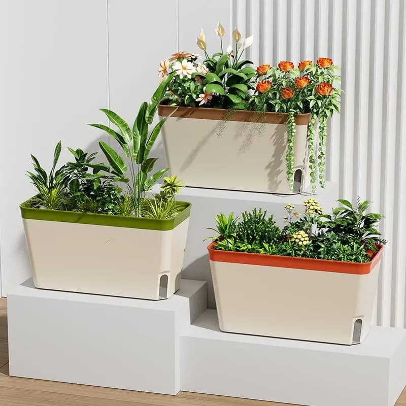 Três vasos de flores retangulares com sistema de auto-rega em uma estante branca