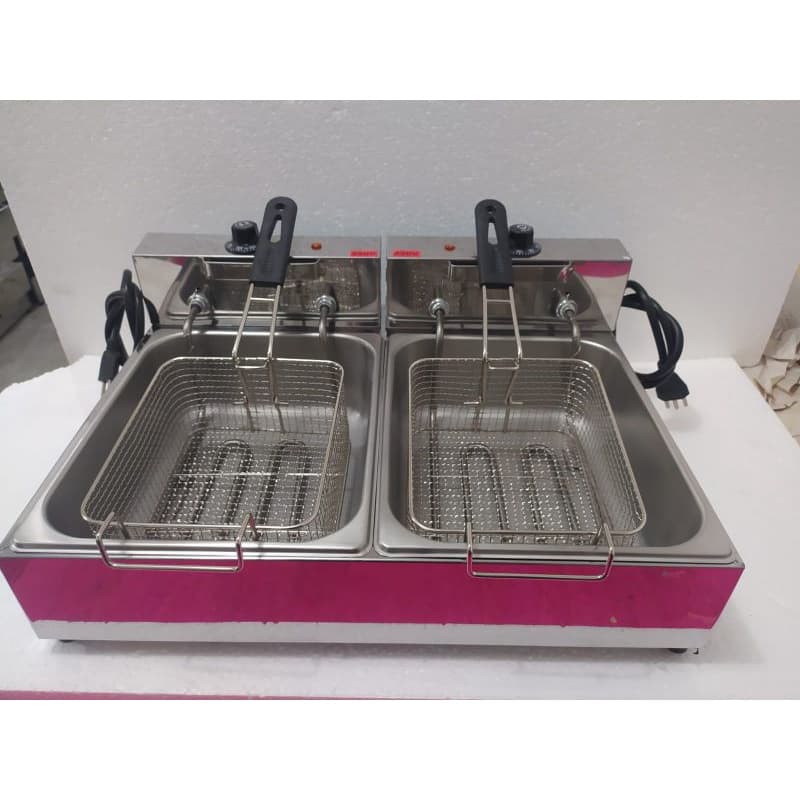 Fritadeira elétrica industrial rosa e inox com duas cubas de 5 litros cada