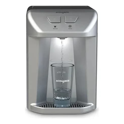 Purificador eletrônico de água Acquabios cinza prateado, água sendo enchida no vidro