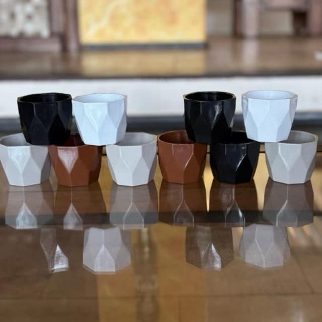 Kit 10 cachepôs decorativos para plantas com designs geométricos em preto, branco, marrom e cinza