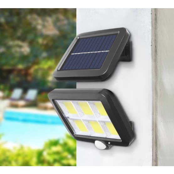 Luminárias solares de parede com LEDs acesos, painéis solares, fundo com piscina e vegetação.