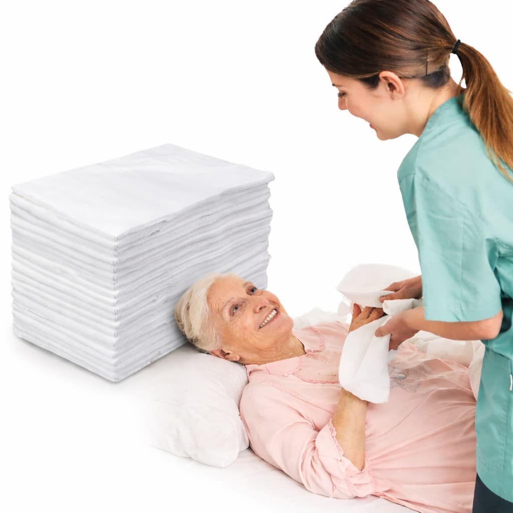 Toalha descartável para idosos em cama, enfermeira segurando toalha branca