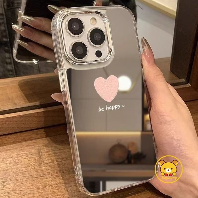 Capa transparente para smartphone com coração rosa e texto 'be happy'