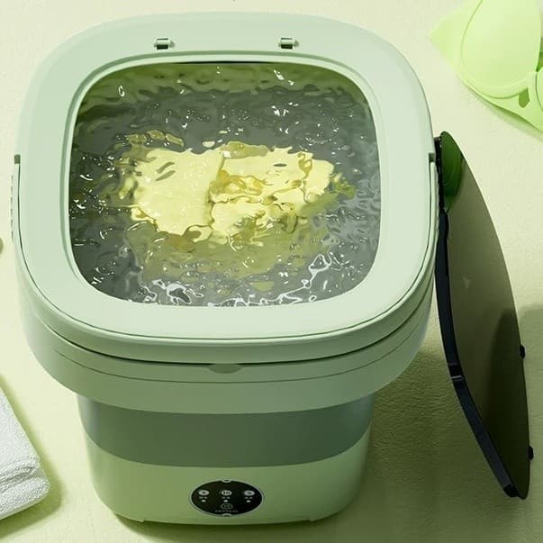 Mini máquina de lavar portátil verde 11L dobrável com roupa dentro