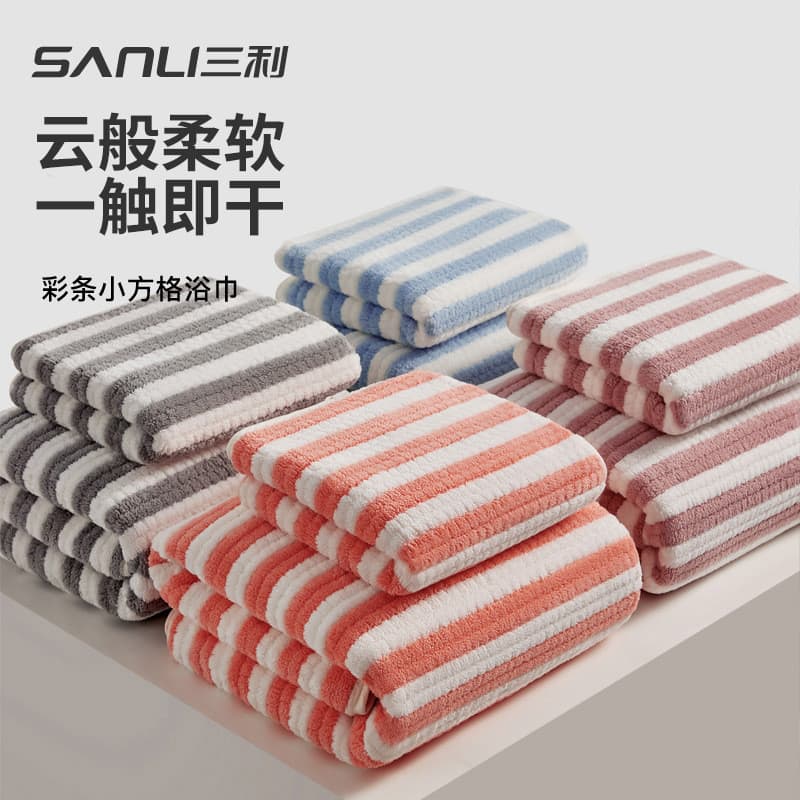 Toalhas de banho Sanli listradas em cores cinza, azul, rosa e laranja.