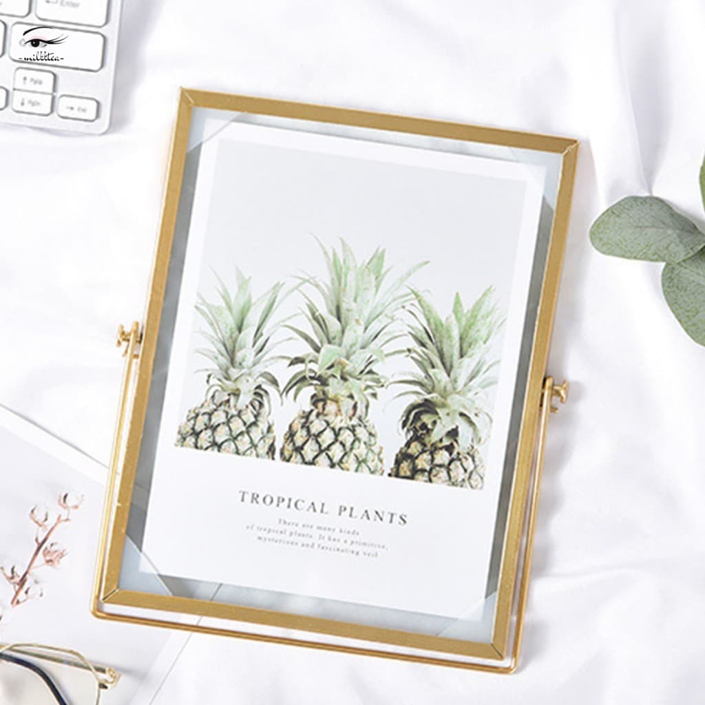 Moldura flutuante de metal com imagem de plantas tropicais