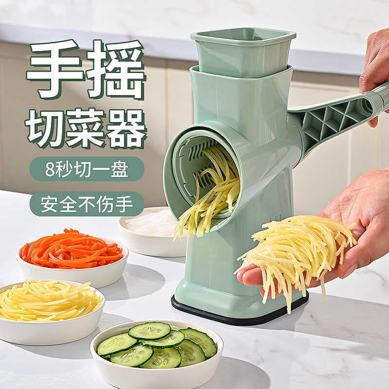 Cortador de legumes multifuncional verde-pálido em uso na cozinha