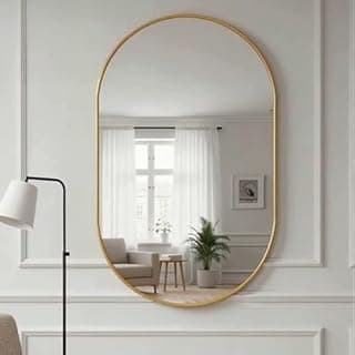Espelho oval decorativo de parede com moldura dourada para banheiro, sala ou quarto.