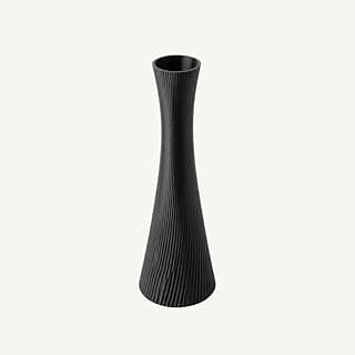 Vaso decorativo em preto com textura ondulada para plantas