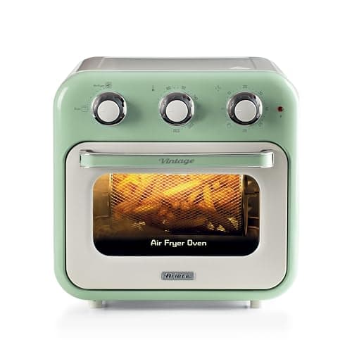 Fritadeira 2 em 1 Ariete 4632 estilo vintage verde com alimentos assando
