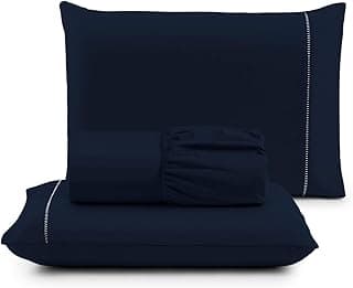 Jogo de cama azul marinho com detalhes prateados, antiácaro e anti-pilling.