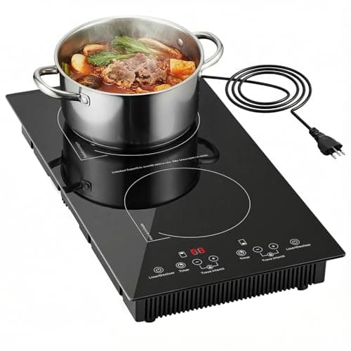 Cooktop de indução preto com pote de metal prateado e sopa quente