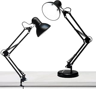 Luminárias articuladas de mesa pretas com base e garra sobre superfície branca