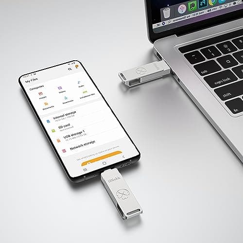 Pen Drive SSD Idiskk 1 TB prata conectado a laptop e smartphone, fácil acesso a arquivos.