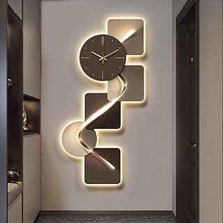 Relógio de parede grande com design geométrico abstrato em preto e cinza, iluminado por LED, para decoração de sala de estar.