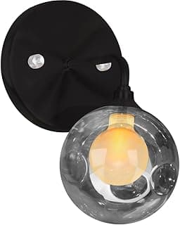 Luminária de parede esférica com cúpula transparente e bolhas, iluminada por uma lâmpada amarela.