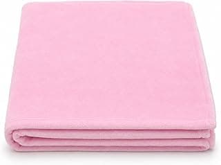 Manta de microfibra rosa para bebê, macia e antialérgica, dobrada em ângulo frontal.
