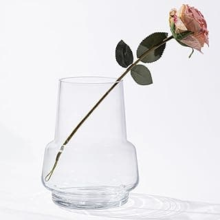 Vaso de vidro transparente com uma rosa, decoração moderna