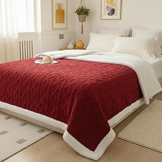 Cobertor Sherpa vermelho macio com efeito em relevo, microfibra e plush, em uma cama com fundo branco.