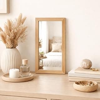 Espelho decorativo retangular 30x15 com design moderno e minimalista refletindo cama e decoração.