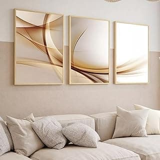Três quadros decorativos abstratos com molduras bege em fundo branco, dispostos verticalmente na parede.
