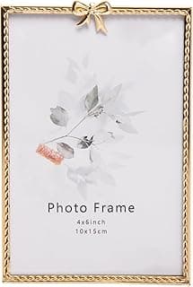 Porta retrato dourado Wolff 10x15cm com flor cinza e rosa