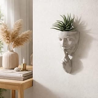 Vaso de parede em forma de rosto com planta artificial verde estilo moderno escandinavo