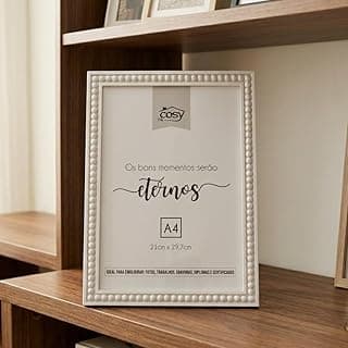 Moldura A4 com design em relevo branco, texto 'Os bons momentos serão eternos' e especificação 'A4'.