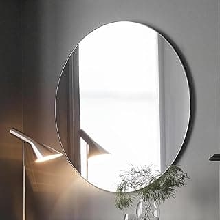 Espelho decorativo redondo 35cm para banheiro e sala, com reflexão de lâmpada e planta
