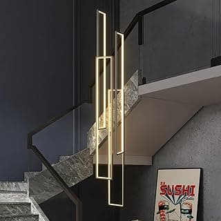 Luminária pendente LED moderna e dimerizável, iluminação amarela, estrutura retangular preta, ambiente com escadaria de mármore cinza.