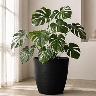 Vaso de planta oval moderno com folhas verdes brilhantes