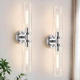 Conjunto de duas arandelas de parede cromadas com vidro transparente, iluminadas