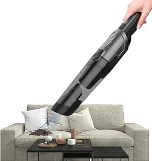 Aspirador de pó sem fio preto em uso em uma sala de estar