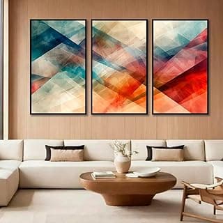 Kit com 3 quadros decorativos abstratos geométricos com molduras pretas em uma sala de estar