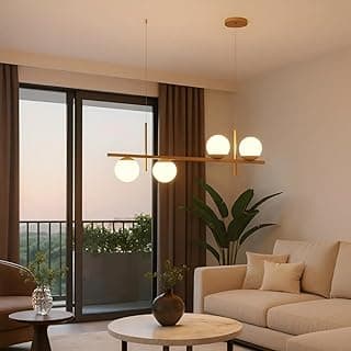 Luminária pendente moderna com quatro globos de vidro dourado em uma sala de estar