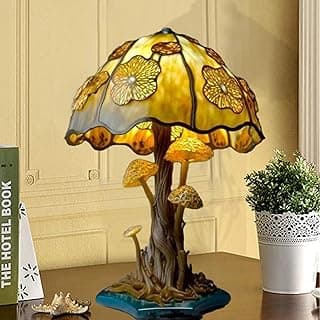 Luminária de mesa em forma de cogumelo com cúpula amarela e detalhes em resina