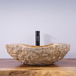 Pia de vaso de pedra de canoa cinzelada com formato orgânico, cinza com tonalidades douradas.